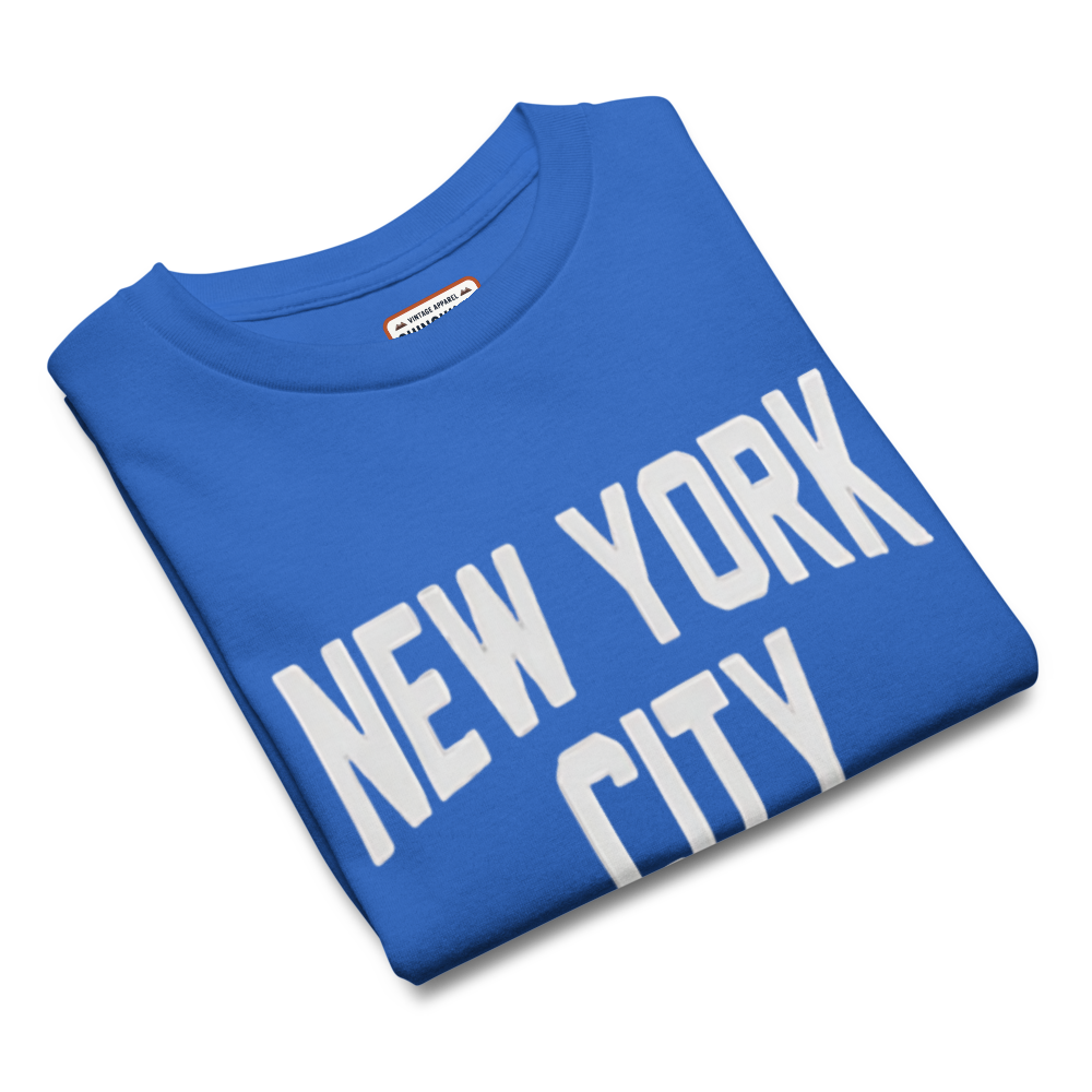 Blue t-shirt with 'New York City' text on a white background